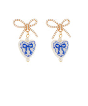 Load image into Gallery viewer, Rhinestone &amp; Painted Ceramic Bow Heart Earrings
