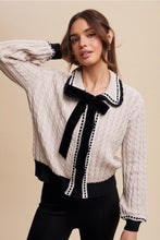 Load image into Gallery viewer, Cable Knit Cardigan with Velvet Bow Detail
